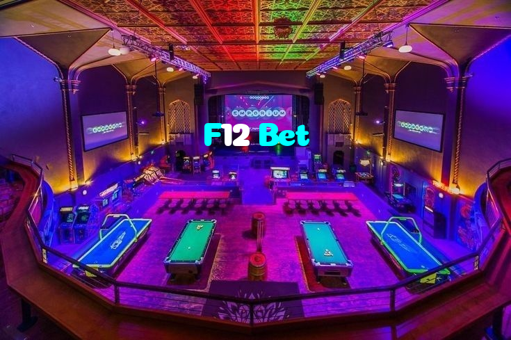 F12 Bet casino presented on mobile device in Pakistan with slots and live games